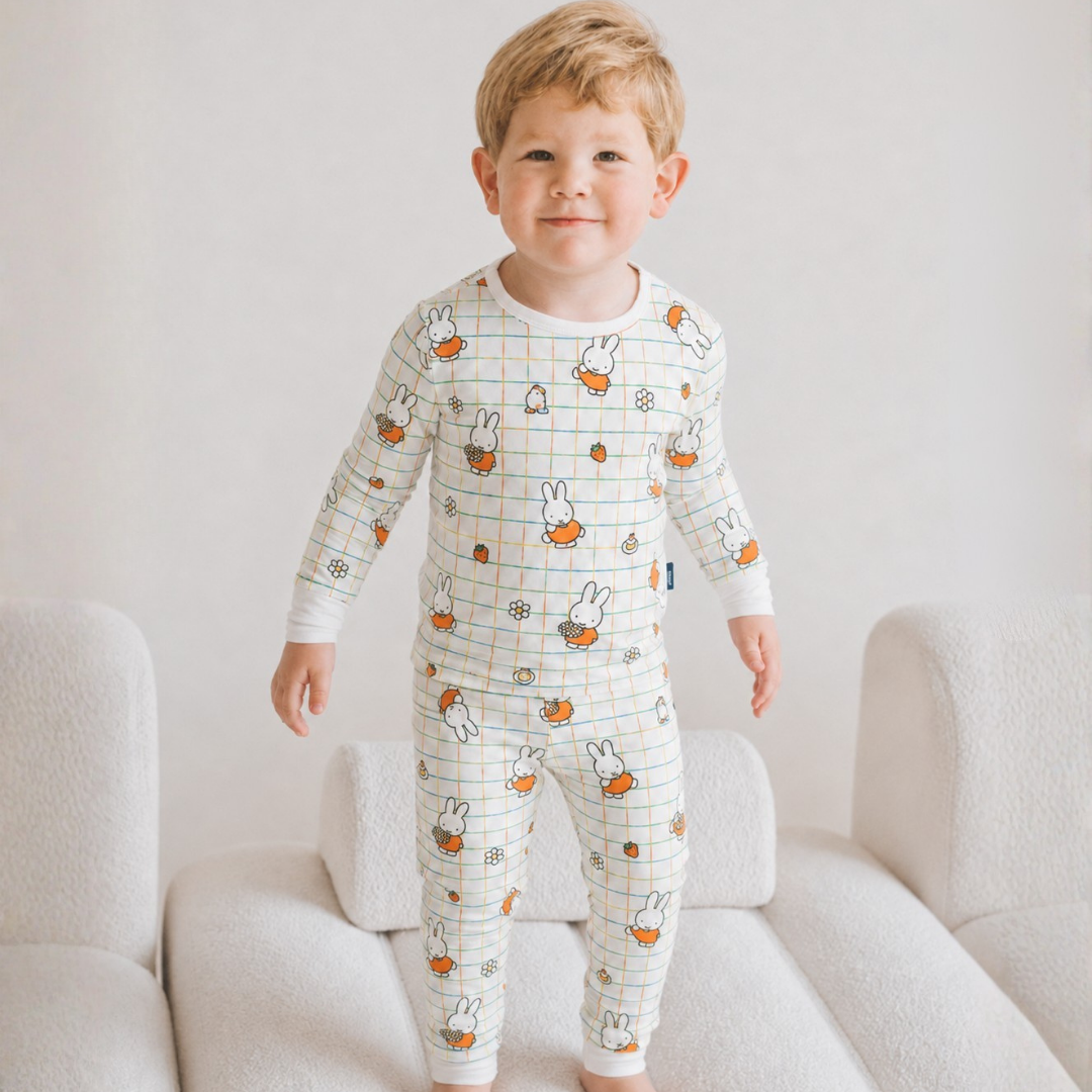 Child wearing the Children's Miffy Checkered Bloom bamboo pyjama set
