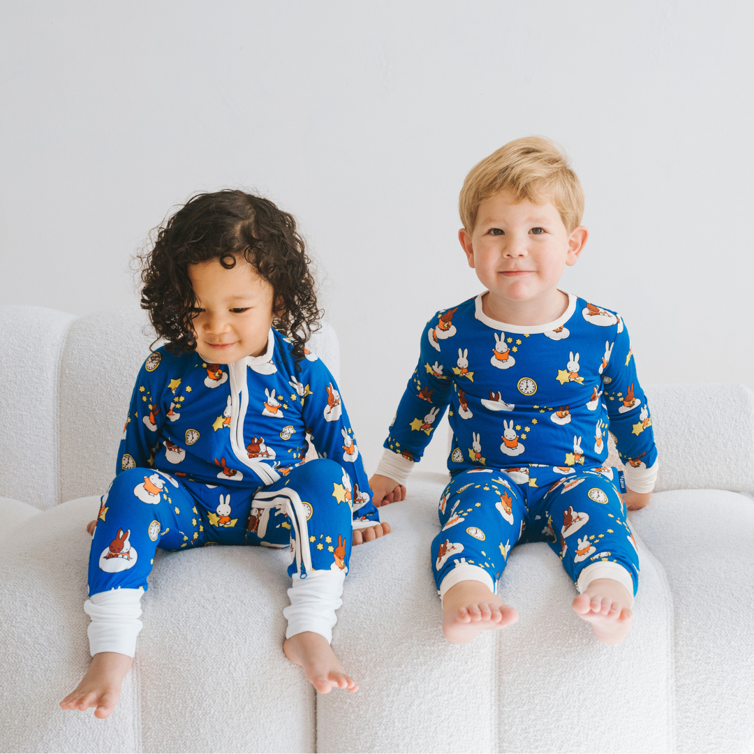 Baby wearing the ZIPSTER x Miffy Starry Sleep bamboo babygrow