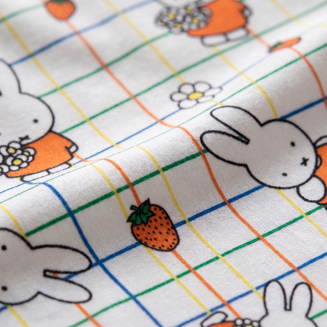 Close-up of the soft bamboo fabric of the Children's Miffy Checkered Bloom bamboo pyjama set