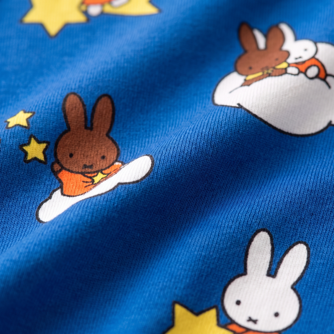 Close-up of the soft bamboo fabric of the ZIPSTER x Miffy Starry Sleep bamboo babygrow